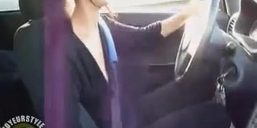 Female driver gives a car handjob and licks up the cum