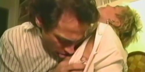 Attractive blonde woman takes it from behind in bed