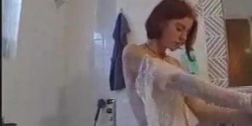 Redhead masturbating in bathroom