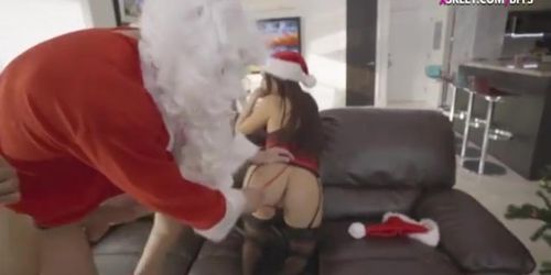 Santa man fucked two sexy babes in santa costume on sofa