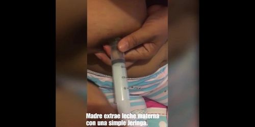 Sexy fat latina women pumping milk at syringe (lactation)