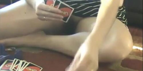 Showing off her pussy while playing Uno