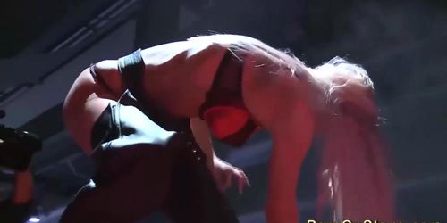 busty blonde orgasm on public stage