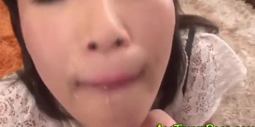 Asian slut gulps down cum