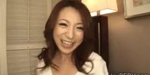 Cheating Japanese wife gets on her knees to blow a big dick