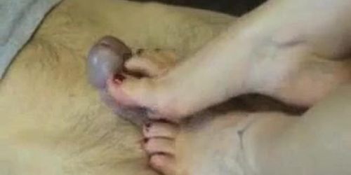 Wife makes her husbands fat dick cum with her foot