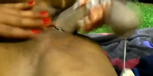 Horny ebony girl slurping on blonde pussy under the sun