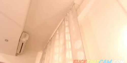 She inserts the dildo up her ass very slowly