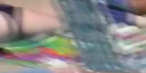 Nicely shaped chick on her belly in beach candid video 04u