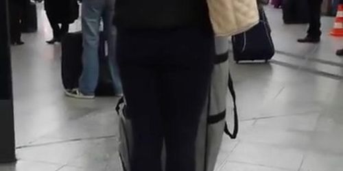 Candid street, shiny jacket and blue leggings