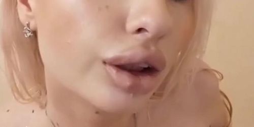 Skinny blonde with B cup boobs is teasing you in font of the camera.