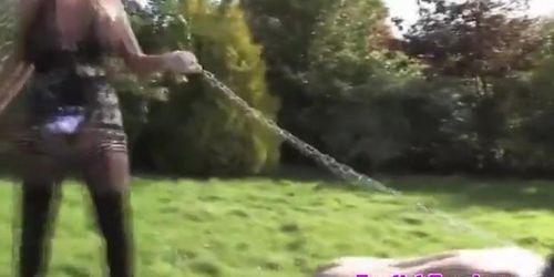 Bizarre outdoor domination with busty femdom
