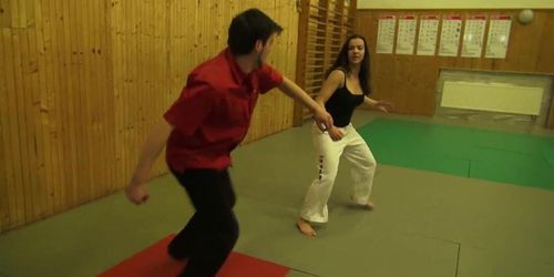 Karate girl beats man 