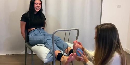 Nervous 18 years old Katarina gets her soft feet tickled!