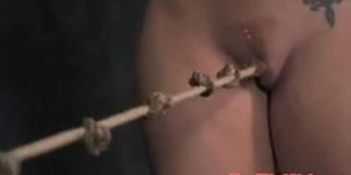 Bonded submissive slut handles nipple clamps