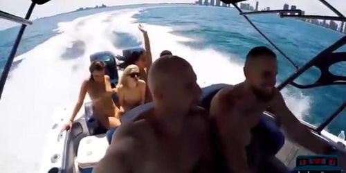 Teen hotties get naked and fucking on a speed boat