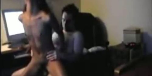 Ebony babe rides white cock on a chair