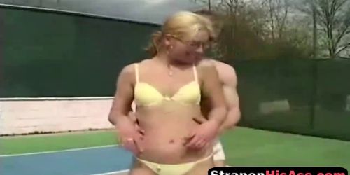 Tennis teacher gets ass fucked with a strap on