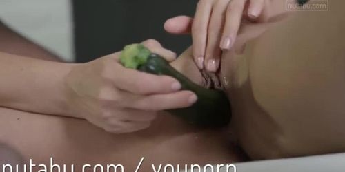 Naughty lesbian fucks young lover with zucchini