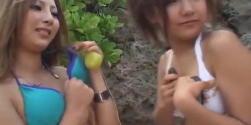 Shiho Kano and dolls play with vibrators on pussies on the beach