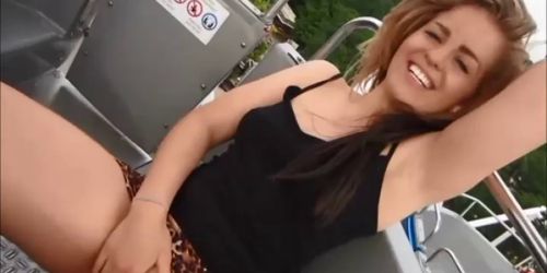 German slut no panties flashing in amusement park and smiling