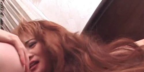 Redhead Asian seductress fucked in her sexy hairy pussy