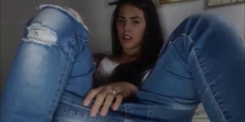 Horny teen in jeans masturbating