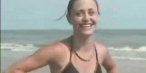 Girl lost bet had to strip on beach