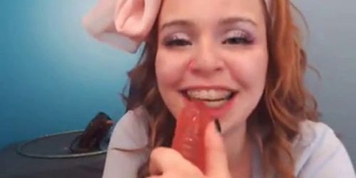 Hot redhead sucks dildo on webcam - video 1