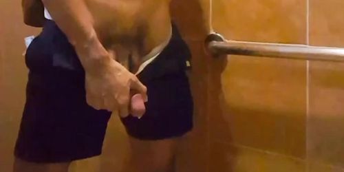 Hot teen trying not to get caught while cruising in public toilet