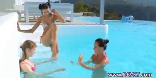 Three babes one lucky guy in pool