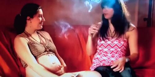 Two beautiful young babes(one pregnant) smoking sexy