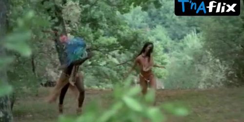 Laura Gemser Breasts,  Bush Scene  in Black Emanuelle