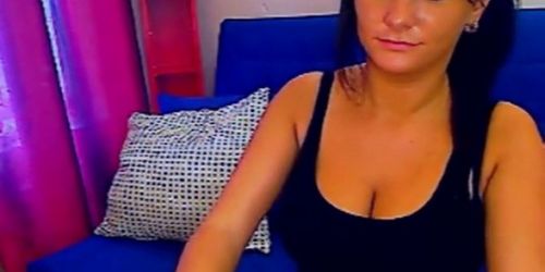 Busty black haired babe shows off - video 1