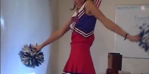 Brunette Cheerleader Showing Off Her Assets