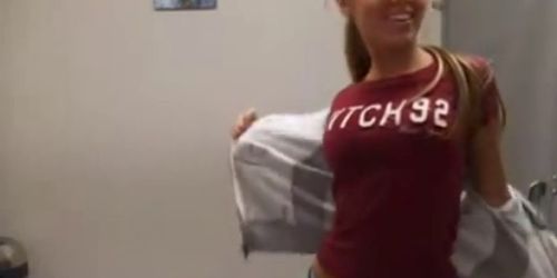 Hot blonde strips in public bathroom