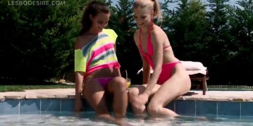 Lesbian teen duo kissing sensually by the pool - video 2