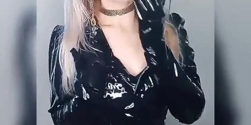 Blonde smoking in Shiny fetish outfit