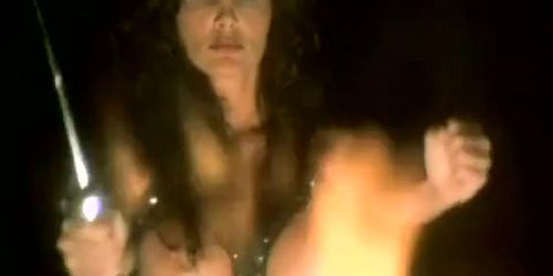 Julie Strain Breasts Scene  in Enemy Gold