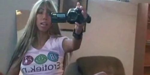 Girl with video camera play her pussy