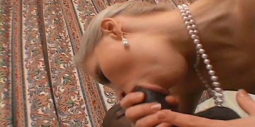 Blond bimbo fucked with black cock