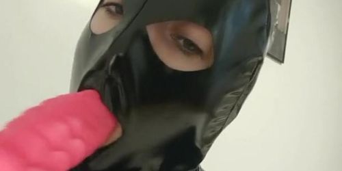 Sucking bad dragon with latex mask on