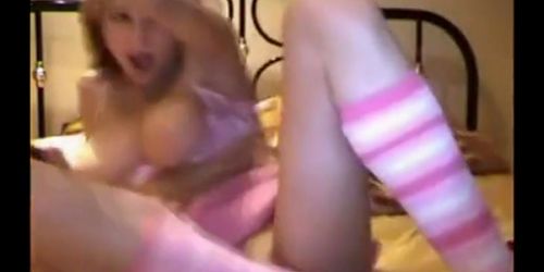 Busty blonde enjoys big dildo on bed - video 2