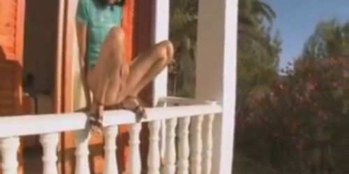 Girl peeing off the porch - video 1