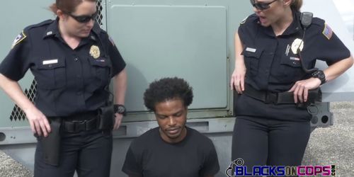 Horny female cops caught a black suspect of a crime