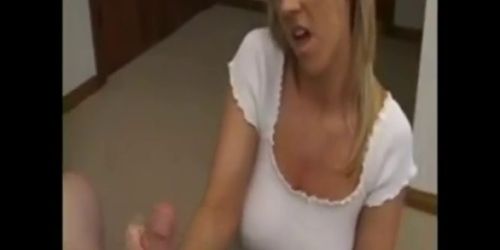 Well endowed blonde tugs at a dudes cock without compassion