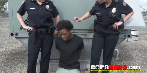 Fro dude is arrested and fucked on rooftop by perverted female officers