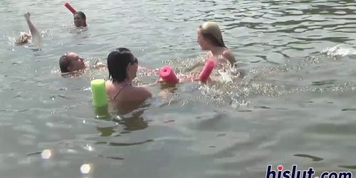 Raunchy babes have fun in the water