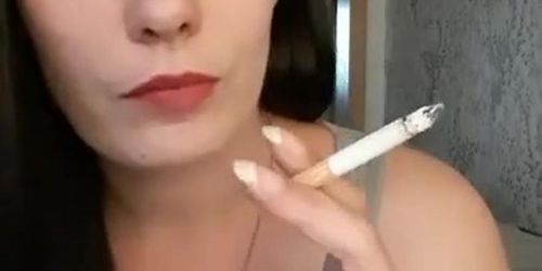 Amazing young brunette girl smoking sexy