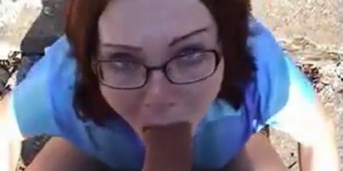 Cute nerd gives blowjob outdoors - video 2